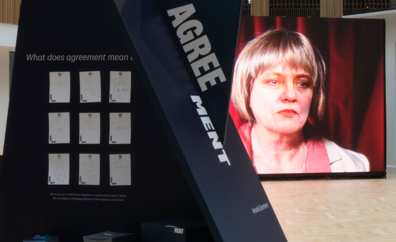 AGREEMENT: 3-sceen presentation, depicts Mo Mowlam portrait made from archival media, machine learning, Ulster University, Belfast. 2023.